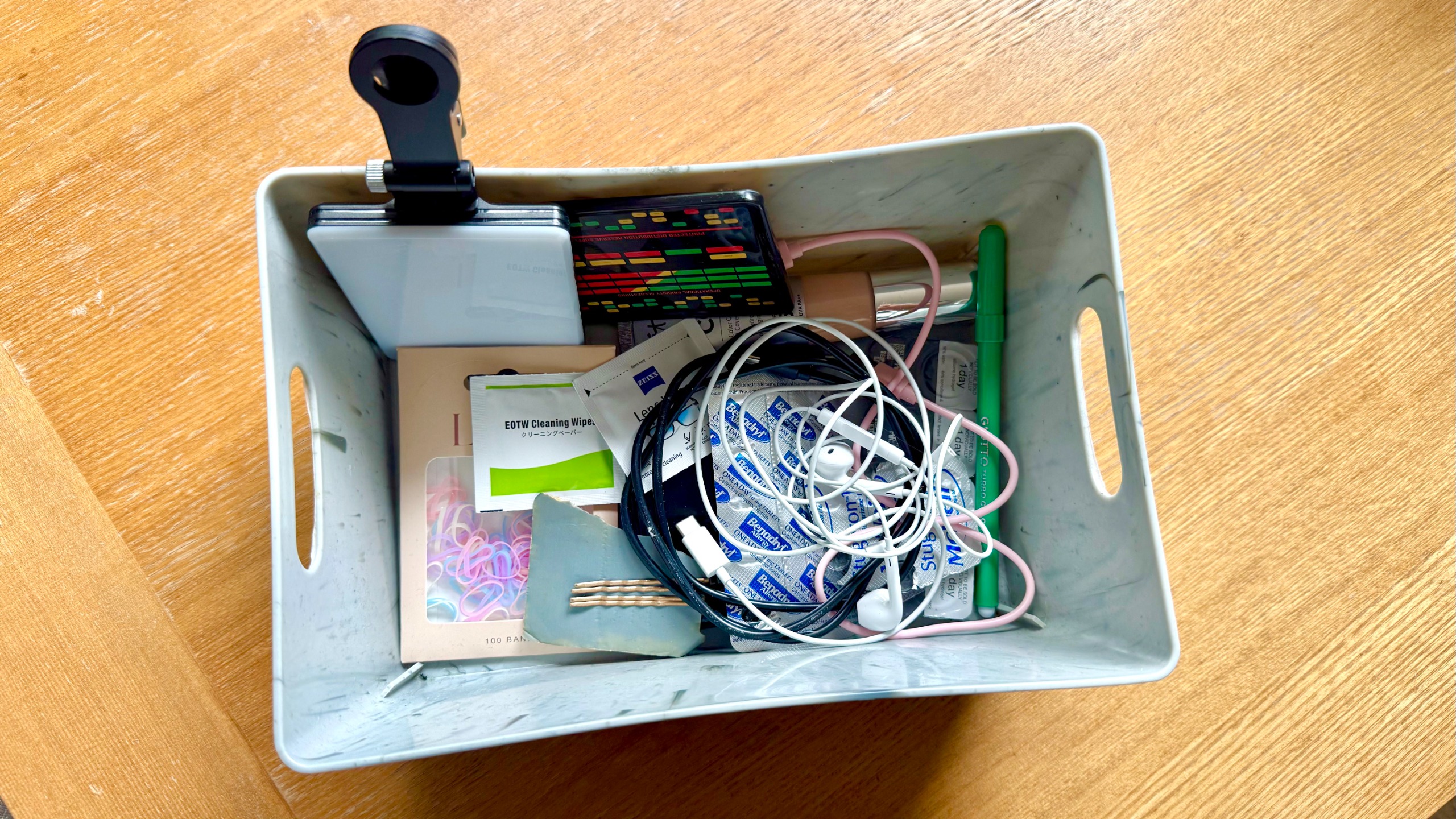 A junk drawer before sending the image to chatgpt to help declutter