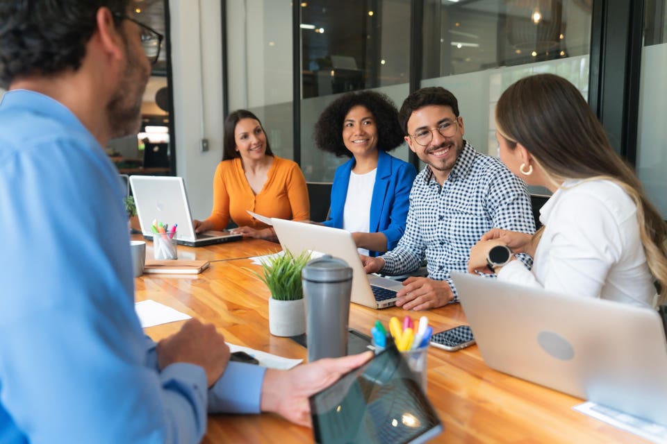 Business people sharing ideas in a meeting at the office