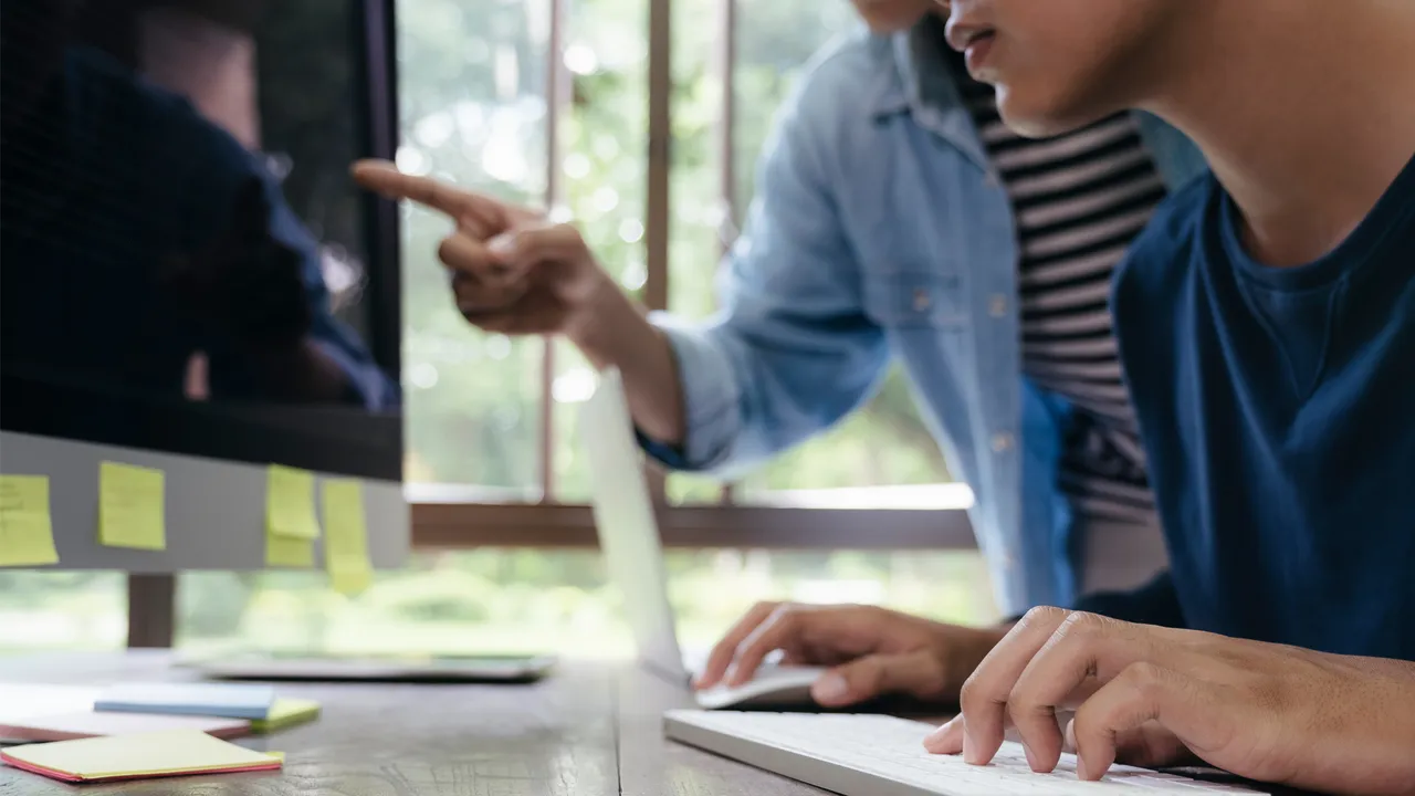 Programmers and developer teams are coding and developing software