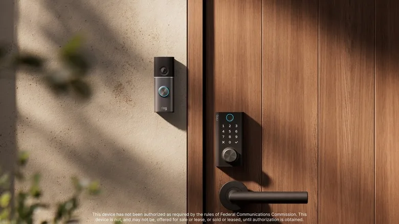 A smart lock on a door next to a camera-equipped doorbell.