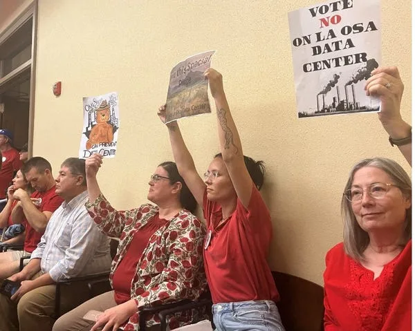 Opponents of the proposed La Osa data center attend a Pinal County Board of Supervisors meeting in Florence, Arizona, on Aug. 26, 2026.